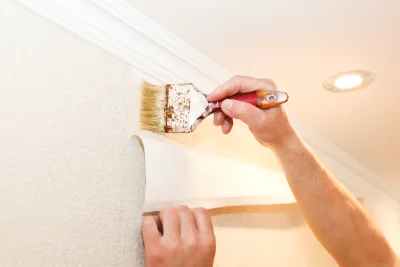 Pose de papier peint à la Caunette — revêtements muraux et toiles de verre